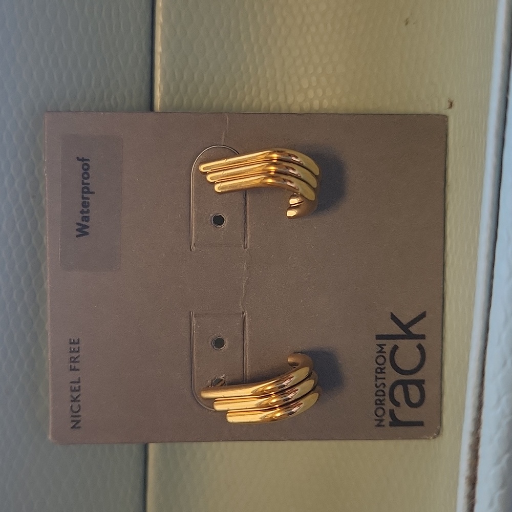 NWOT Never Worn Waterproof gold earrings